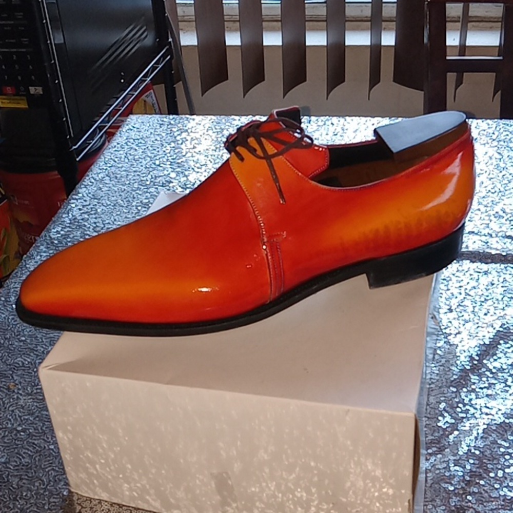 Carthy,Tangerine orange   size 12.